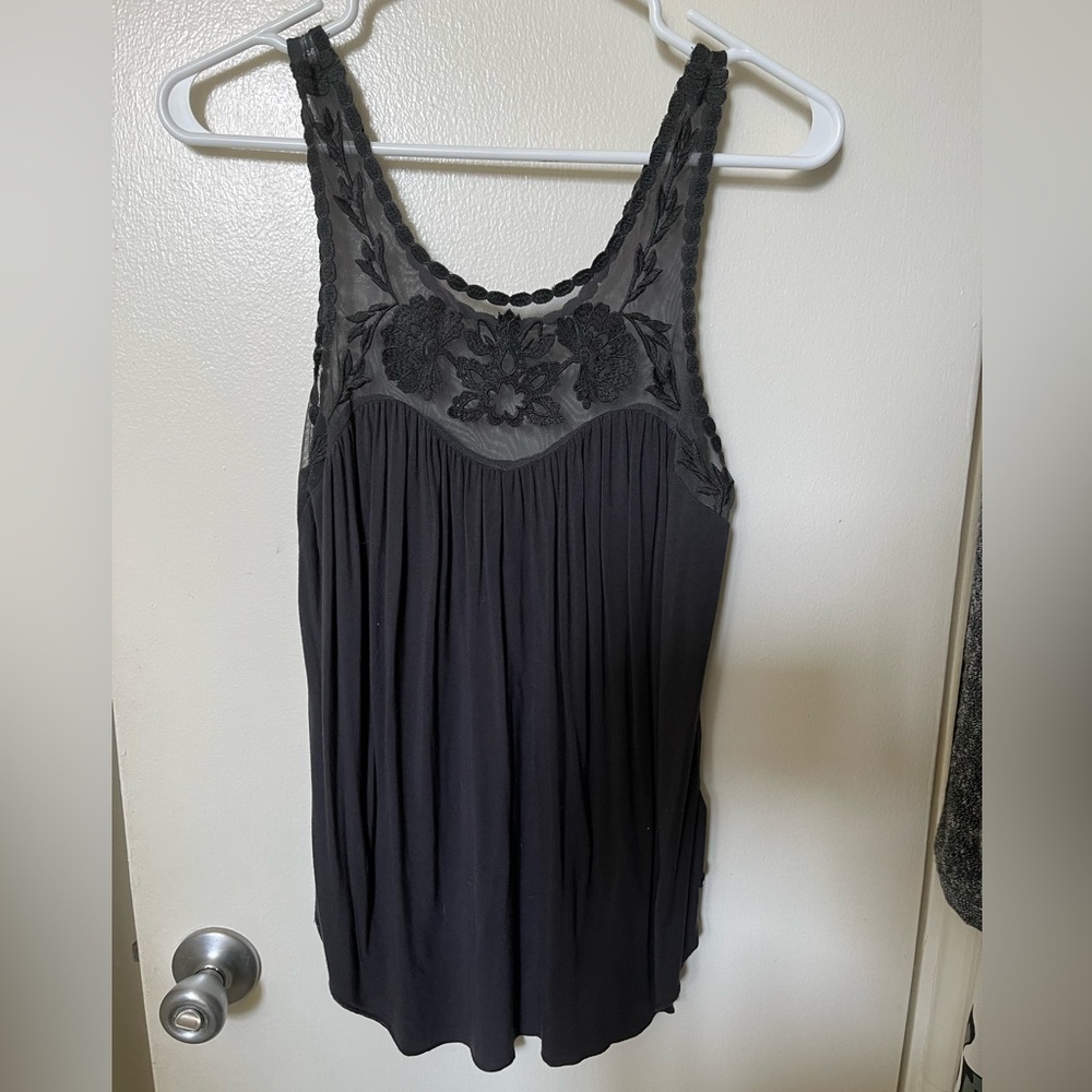 Dark gray, soft flowy top with mesh detail